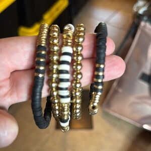 NWOT Gold tone Multi-Strand Bracelet Black White Layered